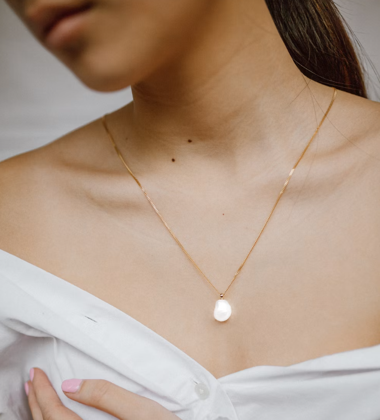Artisan hands crafting fine jewellery at TheHeritageJewels atelier